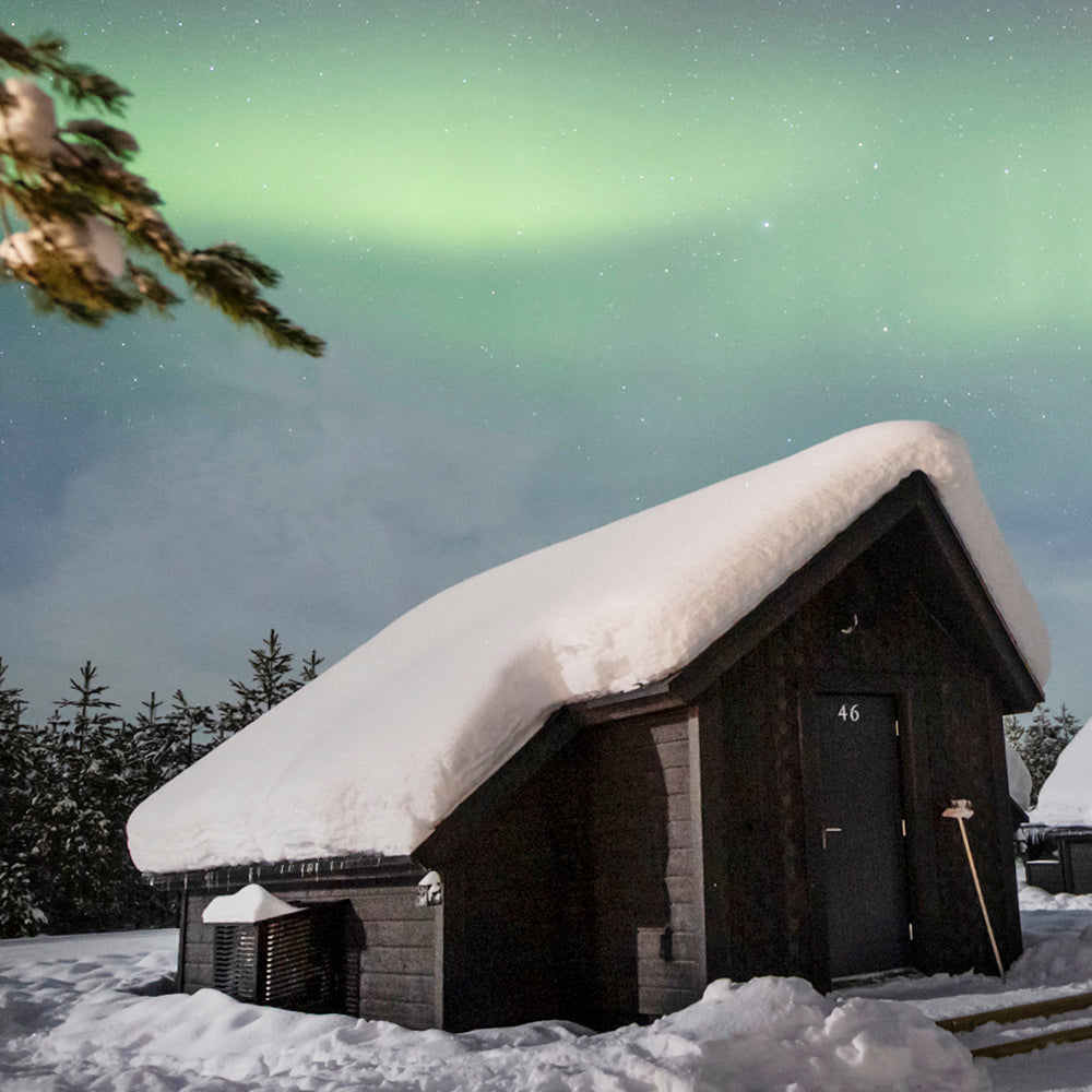 Ilmalämpöpumpun suojakotelo ja sulatusvedenohjain